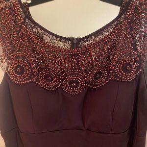 X scape embellish mock warp gown color plum